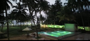Swimming pool beach front resort
